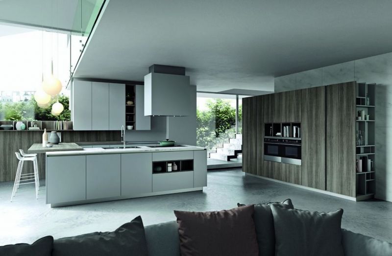Modello caratterizzato dal bordo superiore o laterale delle ante accessoriato da un profilo maniglia che garantisce ottima presa Cucina dibiesse